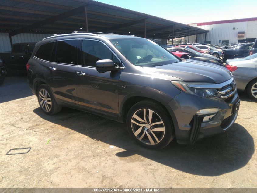 2017 HONDA PILOT TOURING - 5FNYF6H94HB010003
