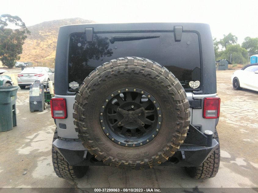 2014 JEEP WRANGLER UNLIMITED SPORT - 1C4BJWDG2EL244688