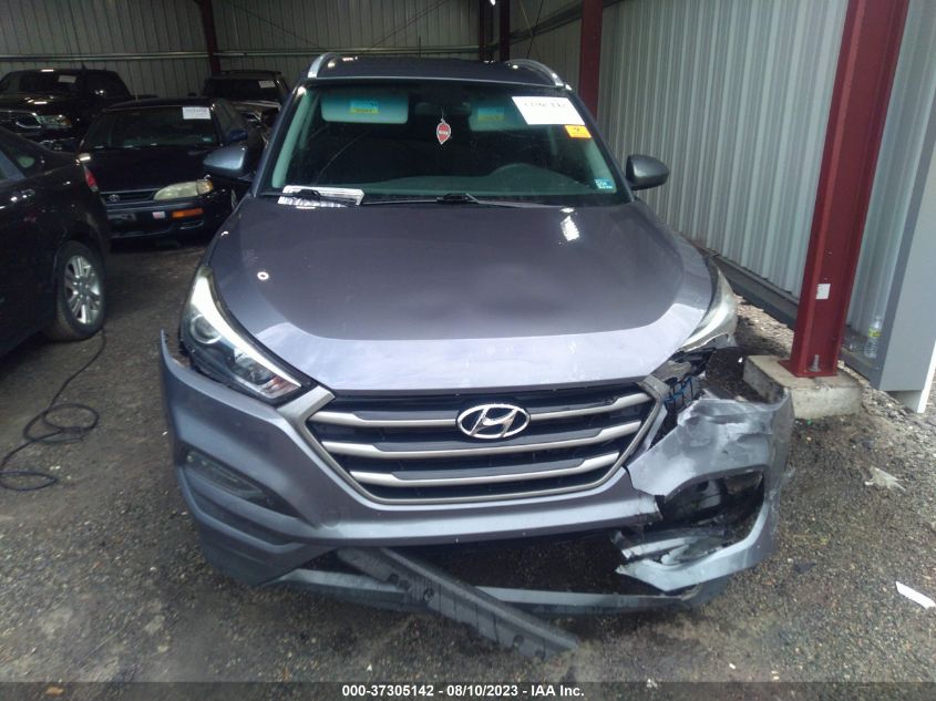 2016 HYUNDAI TUCSON SE - KM8J33A40GU073205