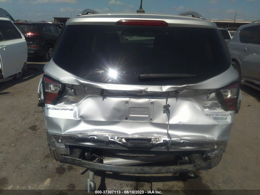 VIN 1FMCU0J93JUD58407 2018 FORD ESCAPE TITANIUM
