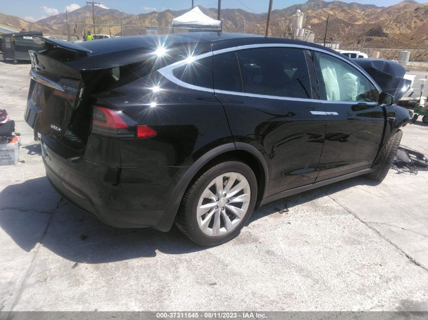 5YJXCBE20KF152165 Tesla Model X 100D 4