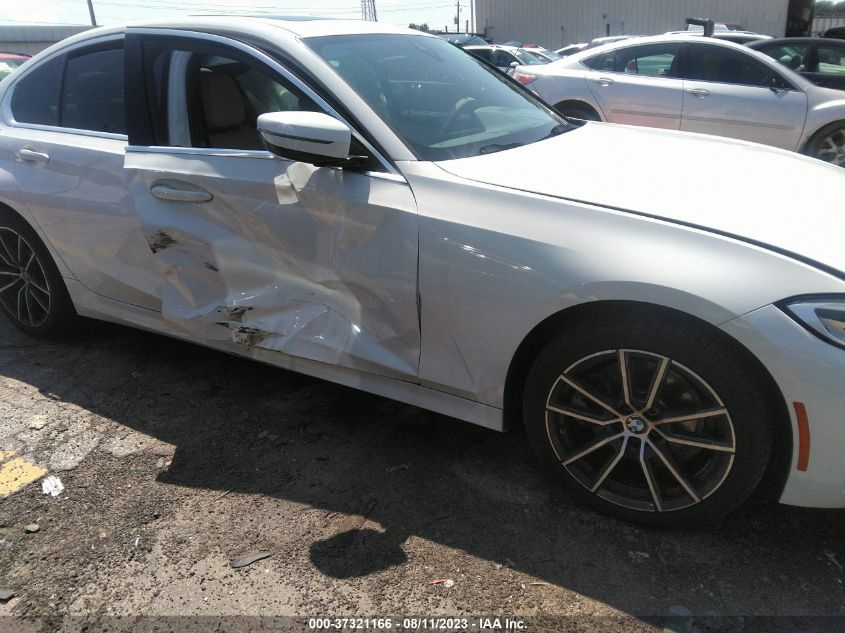 3MW5P7J09M8B91743 BMW 3 Series  6