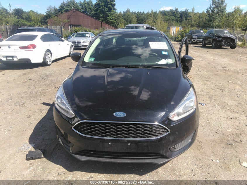 VIN 1FADP3FE9JL216503 2018 FORD FOCUS SE