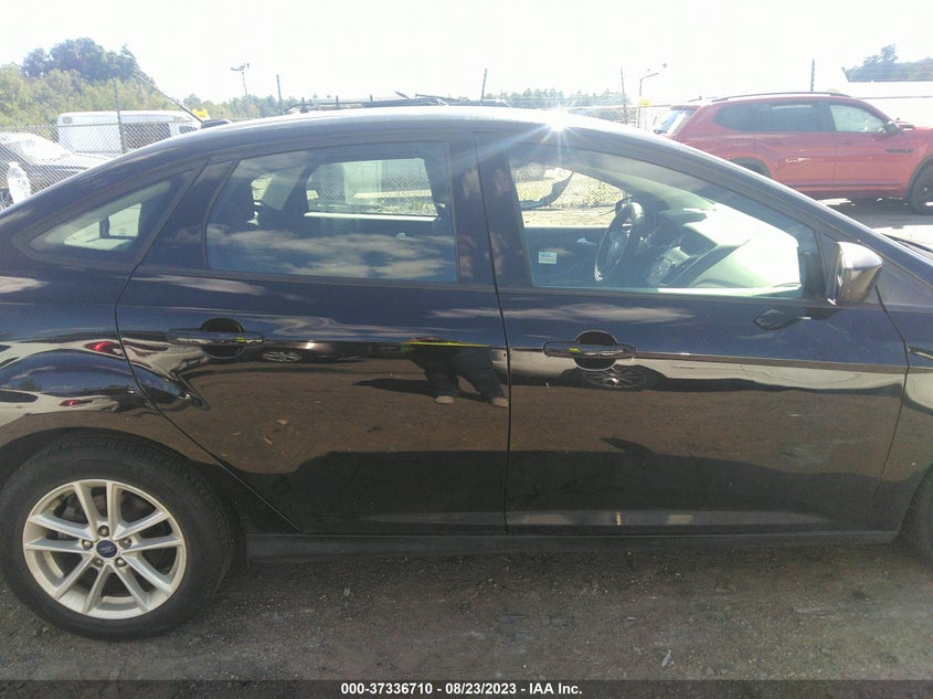 VIN 1FADP3FE9JL216503 2018 FORD FOCUS SE