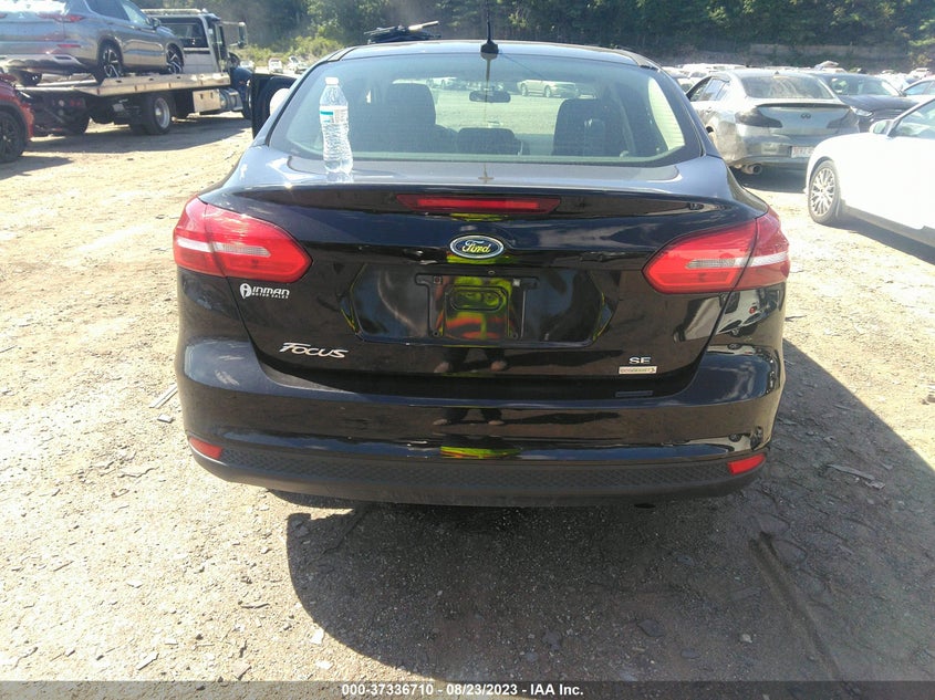 VIN 1FADP3FE9JL216503 2018 FORD FOCUS SE