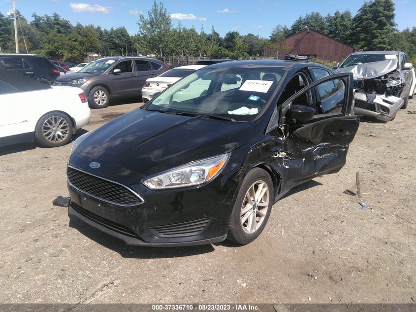 VIN 1FADP3FE9JL216503 2018 FORD FOCUS SE