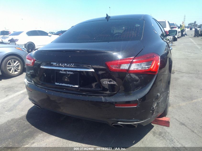 2014 MASERATI GHIBLI ZAM57XSA5E1090310