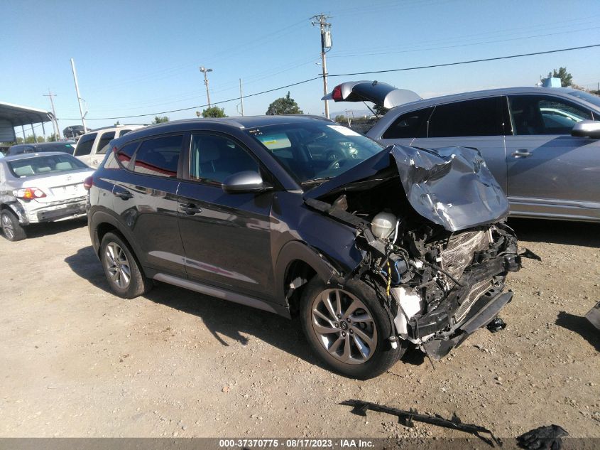 2018 HYUNDAI TUCSON LIMITED/SPORT AND ECO/SE - KM8J33A43JU597455