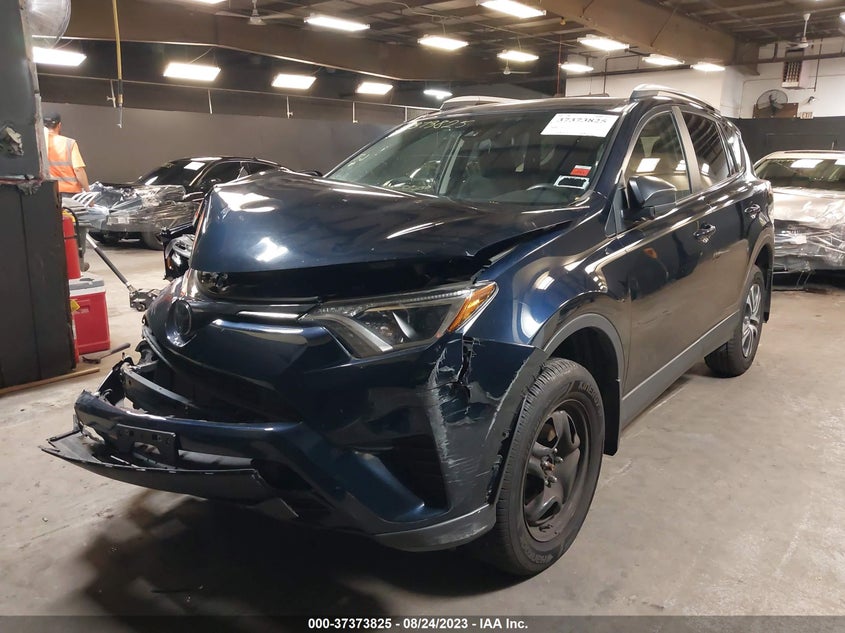 VIN JTMBFREVXJD232387 2018 TOYOTA RAV4 LE
