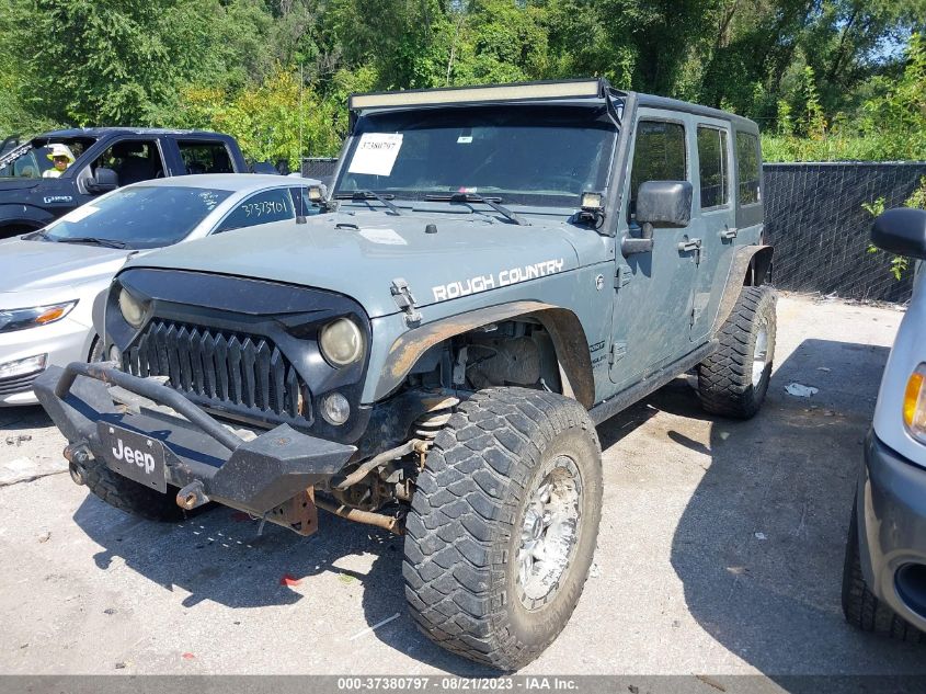2014 JEEP WRANGLER UNLIMITED SPORT - 1C4BJWDG5EL104893
