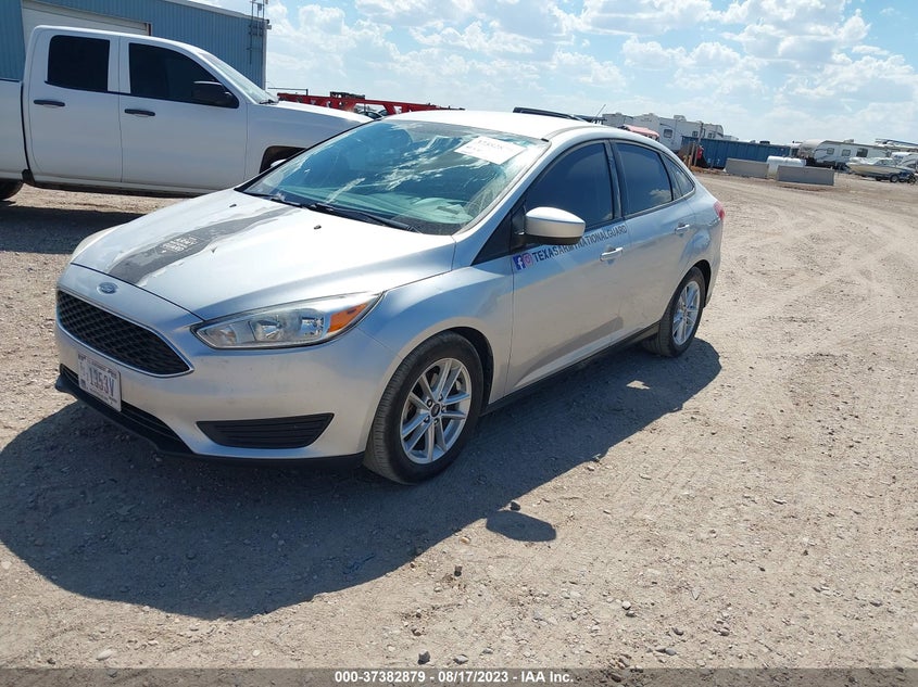VIN 1FADP3F2XJL328779 2018 FORD FOCUS SE