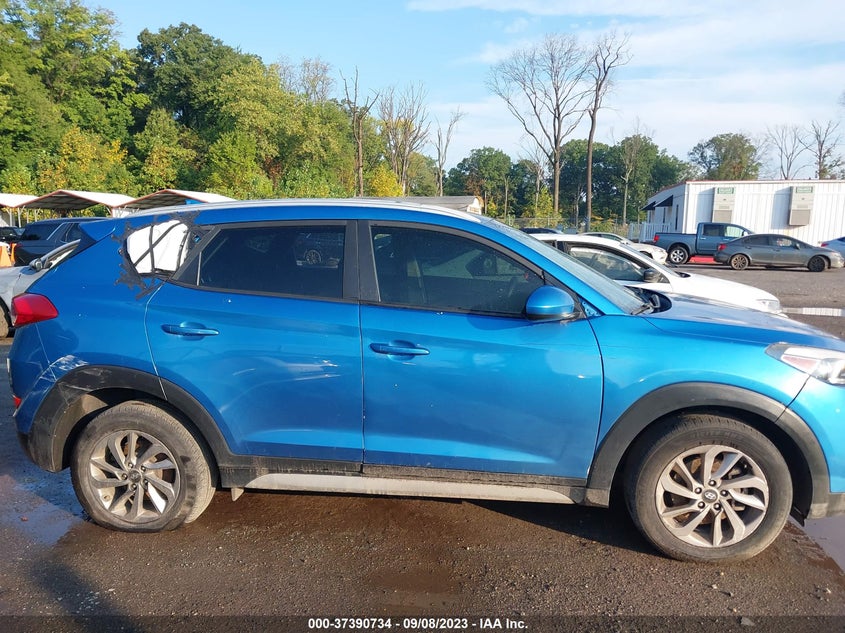 VIN KM8J33A44JU662037 2018 HYUNDAI TUCSON LIMITED/SPORT AND ECO/SE