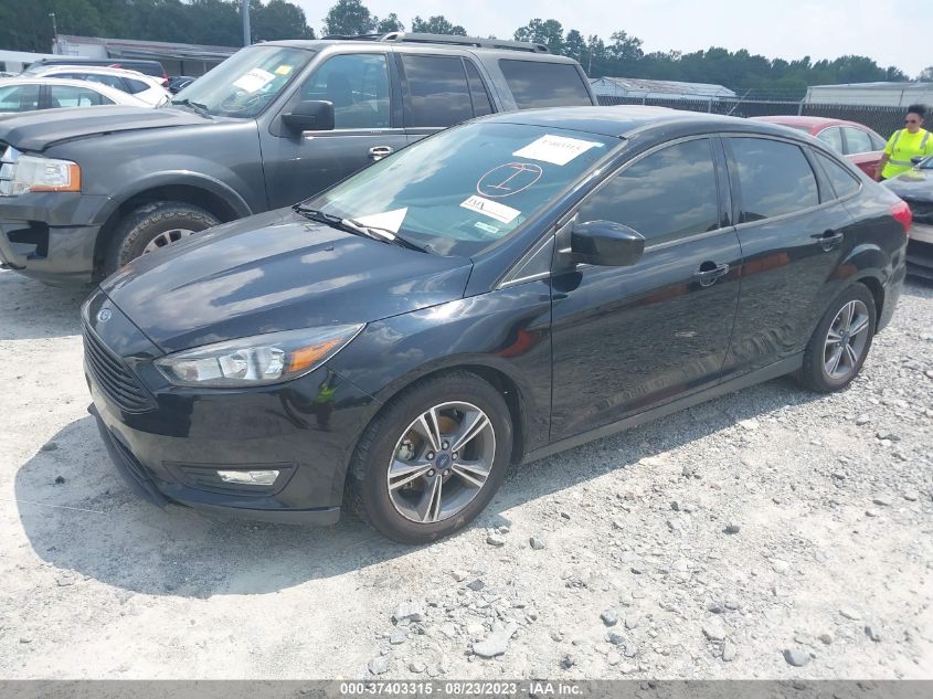 VIN 1FADP3FEXJL291307 2018 FORD FOCUS SE