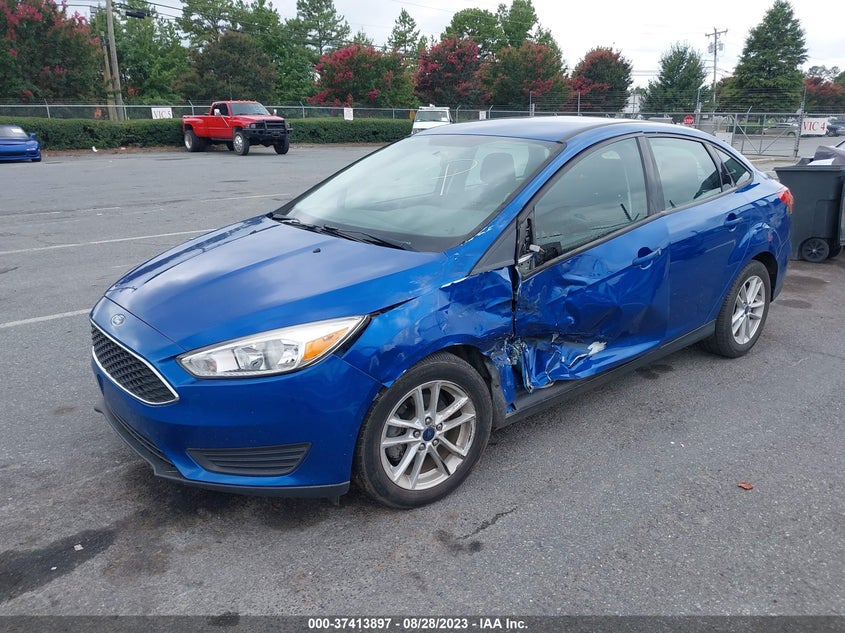 VIN 1FADP3FEXJL238090 2018 FORD FOCUS SE