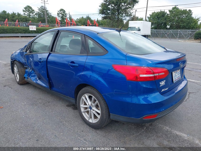 VIN 1FADP3FEXJL238090 2018 FORD FOCUS SE
