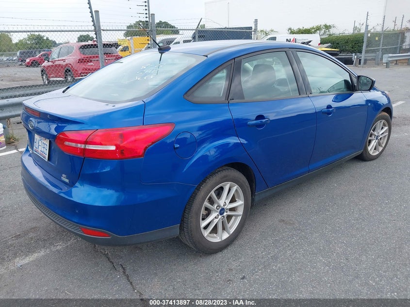 VIN 1FADP3FEXJL238090 2018 FORD FOCUS SE