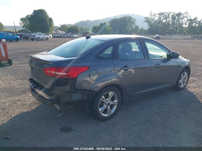 VIN 1FADP3FE1JL325568 2018 FORD FOCUS SE