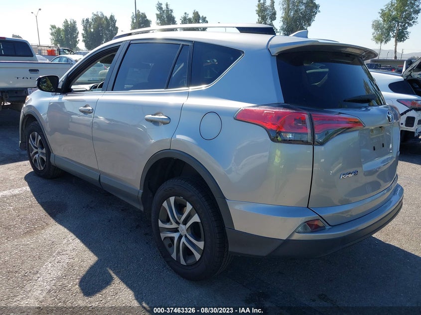 VIN JTMZFREV2JJ210304 2018 TOYOTA RAV4 LE