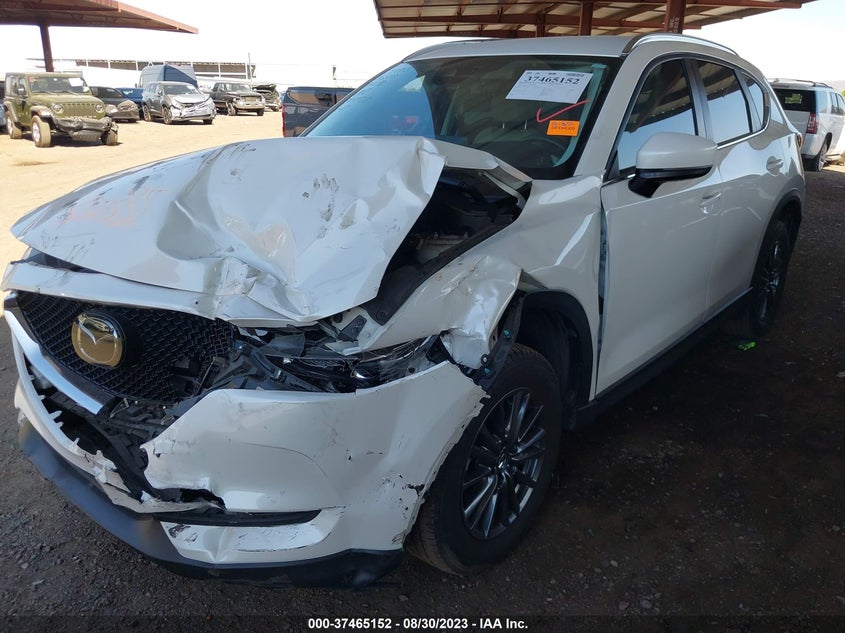 VIN JM3KFACM6M1306493 2021 MAZDA CX-5 TOURING