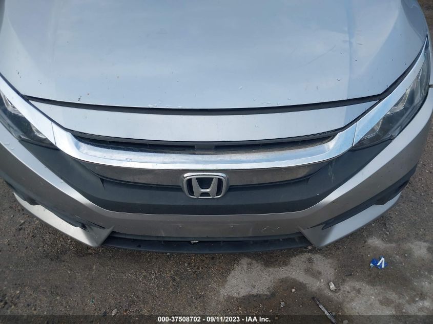 19XFC2F64KE023252 Honda Civic LX 6