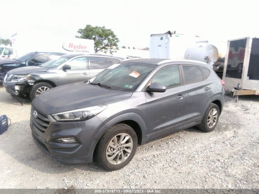 2016 HYUNDAI TUCSON LIMITED/SPORT AND ECO/SE - KM8J3CA40GU160666