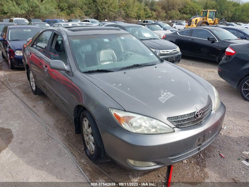 Lot #2539240521 2004 TOYOTA CAMRY XLE salvage car