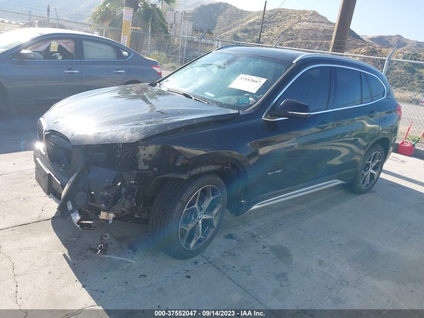 VIN WBXHT3C34J5F90750 2018 BMW X1 XDRIVE28I