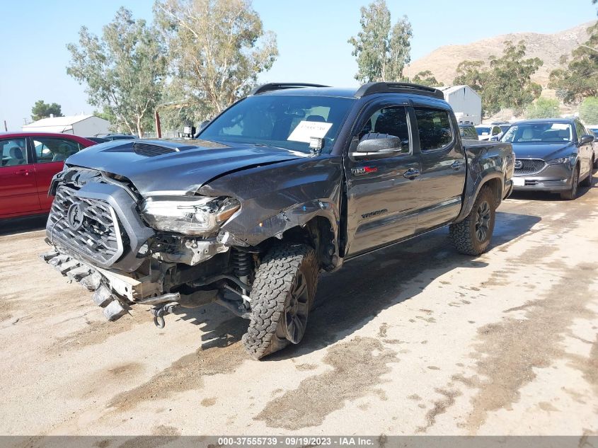 3TMCZ5AN0LM331723 Toyota Tacoma 4wd SR5/TRD SPORT 2