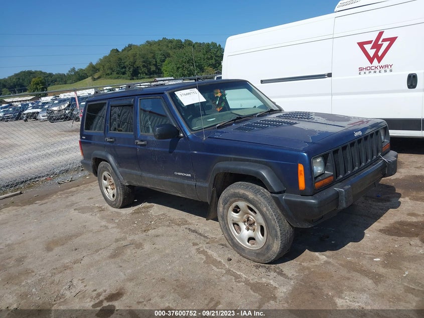 JEEP CHEROKEE RH DRIVE 2000. Lot# 37600752. VIN 1J4FN28S0YL256446. Photo 1