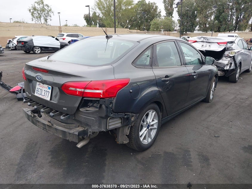 VIN 1FADP3F24JL287520 2018 FORD FOCUS SE