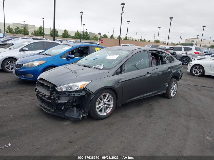 VIN 1FADP3F24JL287520 2018 FORD FOCUS SE