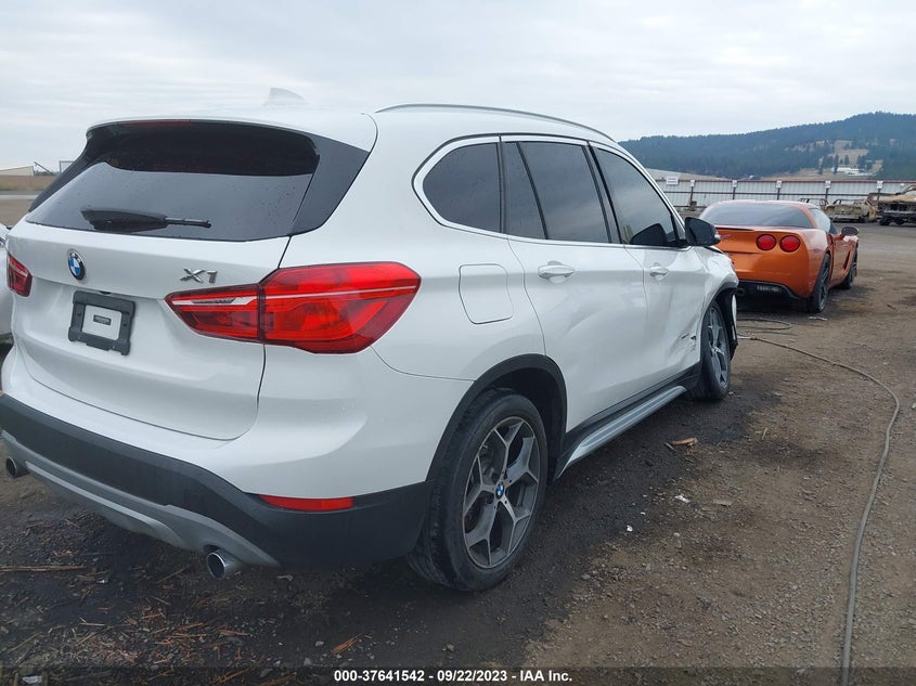 VIN WBXHT3C36J5K27069 2018 BMW X1 XDRIVE28I