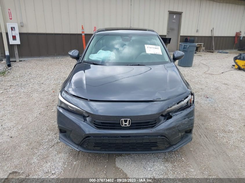 2HGFE1F74PH313596 Honda Civic Sedan EX 12