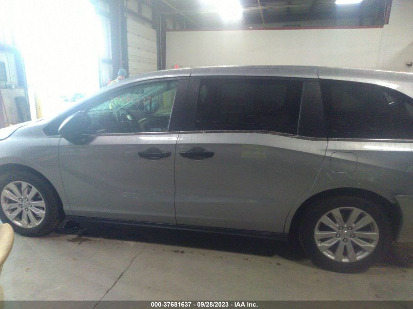 5FNRL6H2XKB023510 Honda Odyssey LX 14