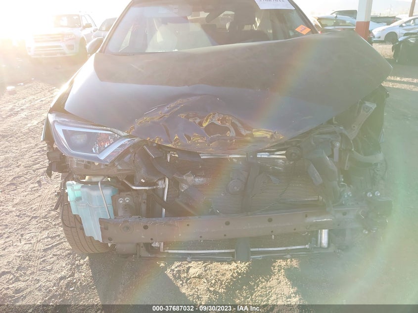 VIN 2T3ZFREV6JW497793 2018 TOYOTA RAV4 LE