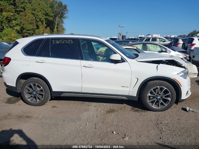 VIN 5UXKR0C52JL070295 2018 BMW X5 no.13