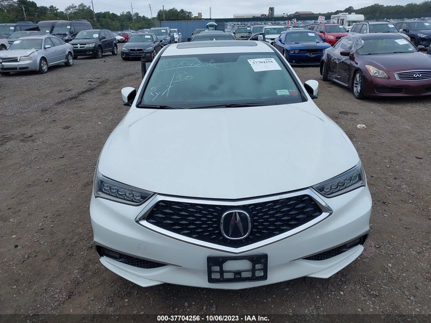 VIN 19UUB3F37JA002744 2018 ACURA TLX