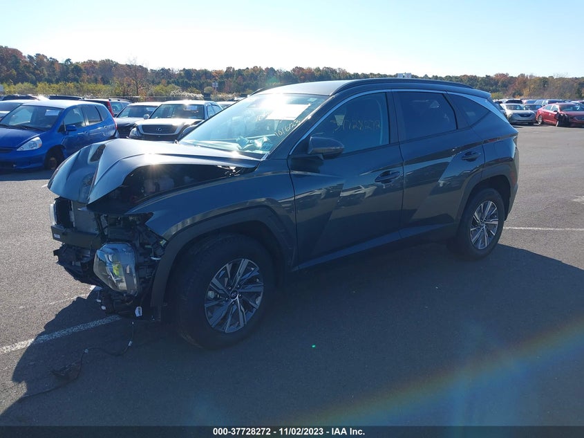 VIN KM8JBCA14NU079126 2022 HYUNDAI TUCSON HYBRID BLUE