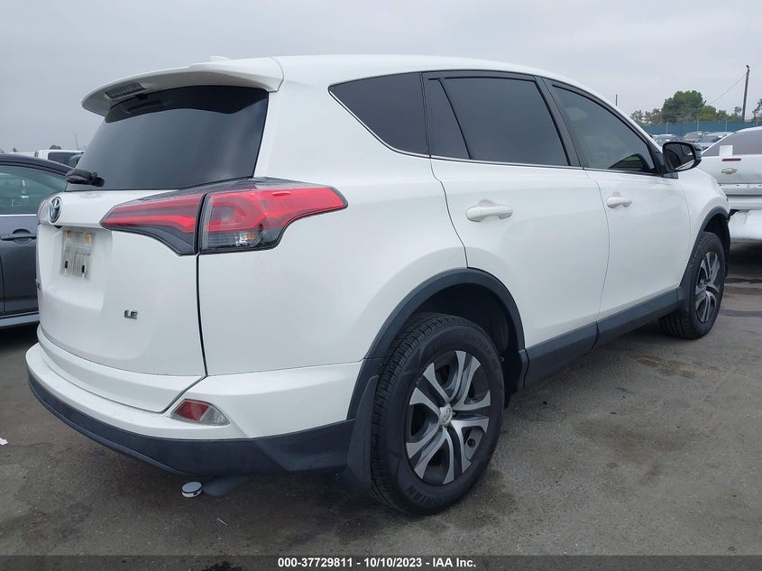 VIN JTMZFREV9JJ179648 2018 TOYOTA RAV4 LE