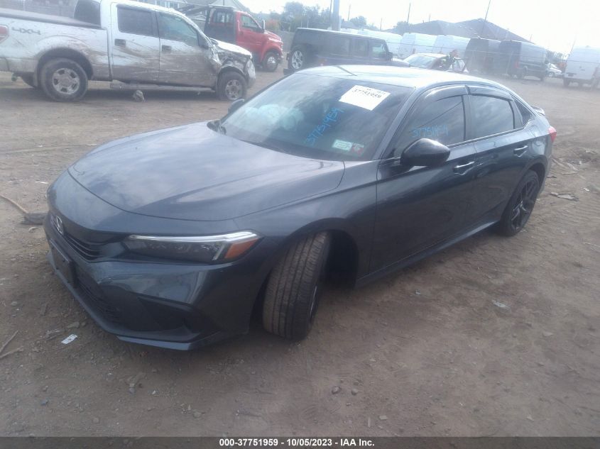 2HGFE2F59PH559032 Honda Civic Sedan SPORT 2