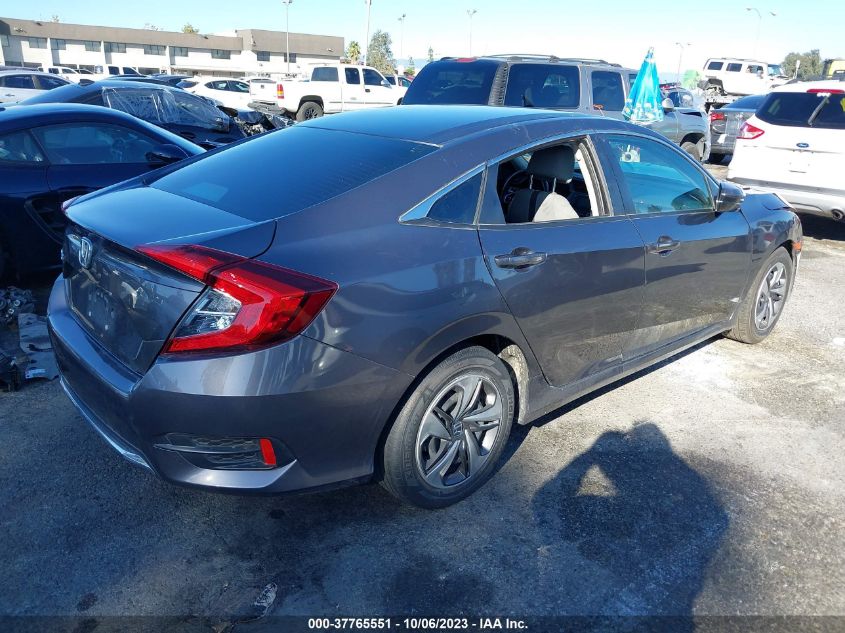 2HGFC2F64MH559983 Honda Civic Sedan LX 4