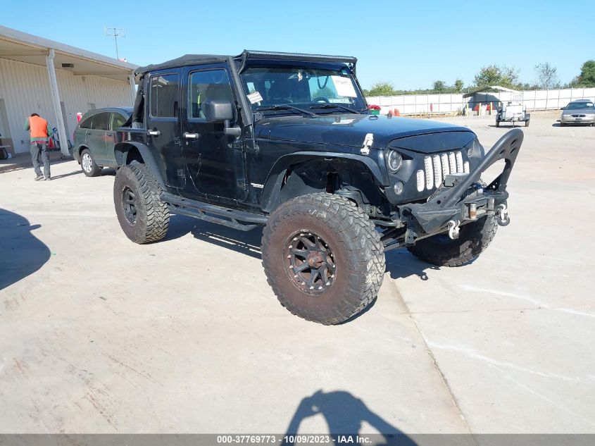 2014 JEEP WRANGLER UNLIMITED SPORT - 1C4HJWDGXEL115334