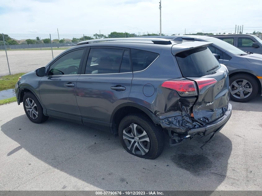 VIN JTMZFREV1JJ204249 2018 TOYOTA RAV4 LE