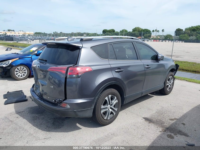 VIN JTMZFREV1JJ204249 2018 TOYOTA RAV4 LE