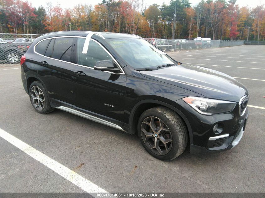 VIN WBXHT3C36J5K20977 2018 BMW X1 no.1