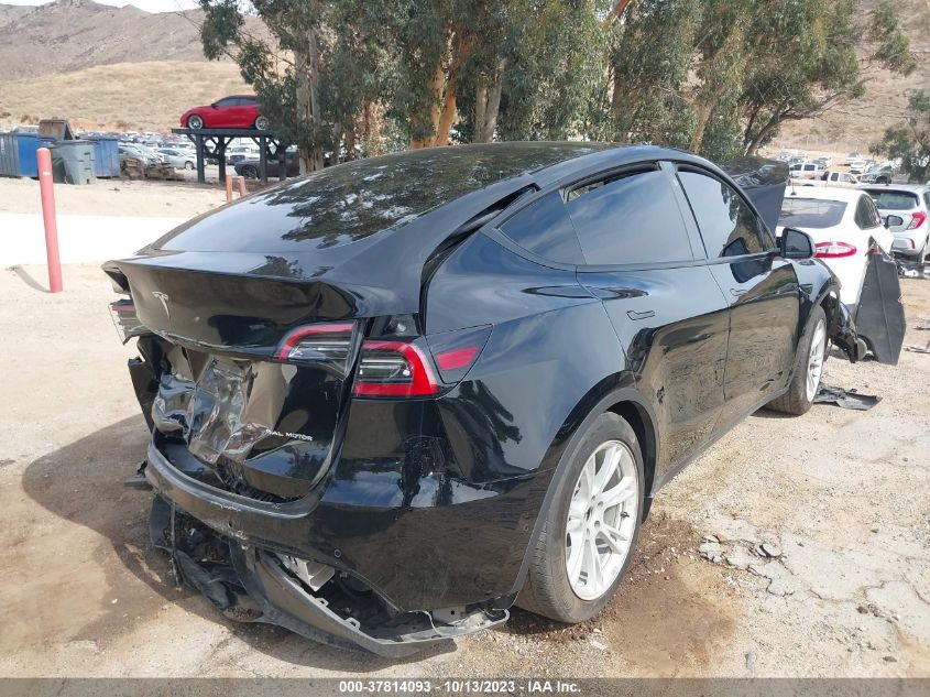 5YJYGDEEXMF273285 Tesla Model Y LONG RANGE 4