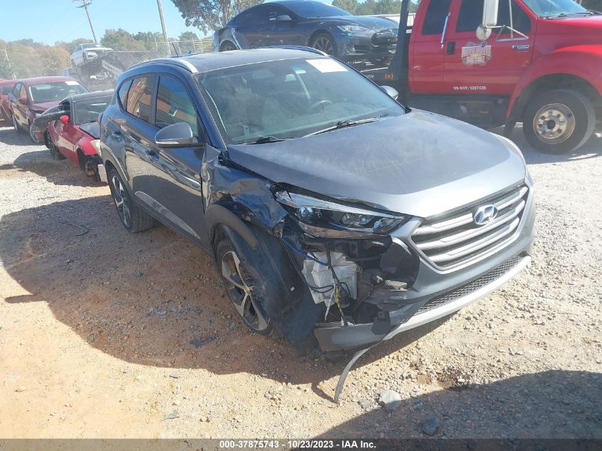 2017 HYUNDAI TUCSON LIMITED/SPORT AND ECO/SE - KM8J33A23HU348274