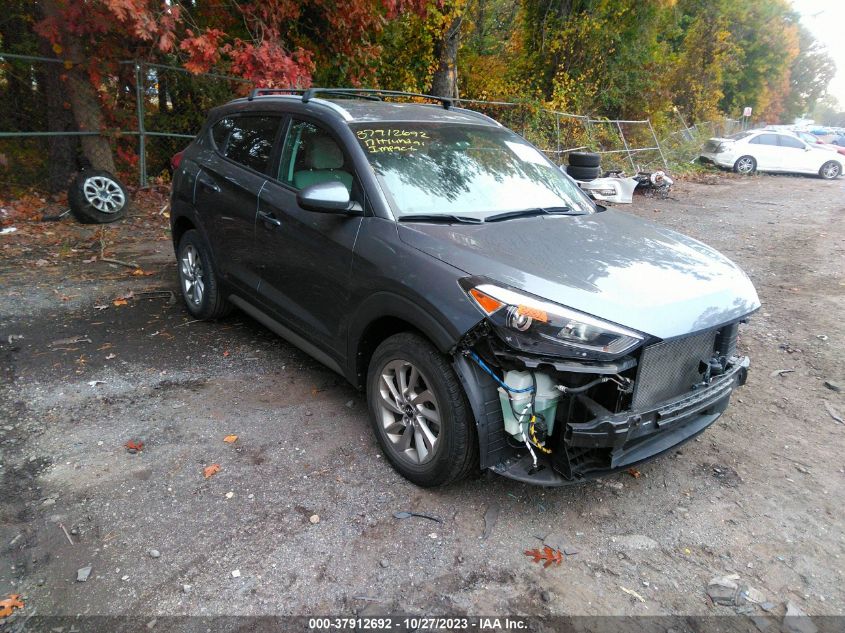 2017 HYUNDAI TUCSON LIMITED/SPORT AND ECO/SE - KM8J33A41HU293437