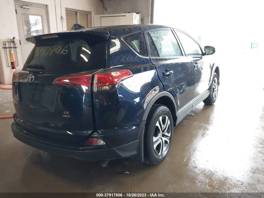 VIN JTMBFREV9JJ245908 2018 TOYOTA RAV4 LE