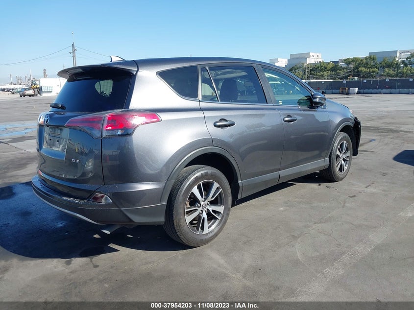 VIN JTMWFREV9JJ724427 2018 TOYOTA RAV4 XLE